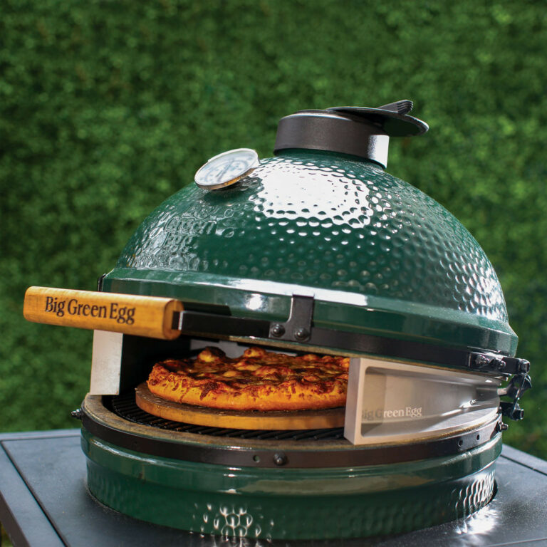 Big Green Egg Releases A Pizza Oven Wedge For Cooking Pizza CookOut   Big Green Egg Pizza Oven Wedge In An Egg 768x768 