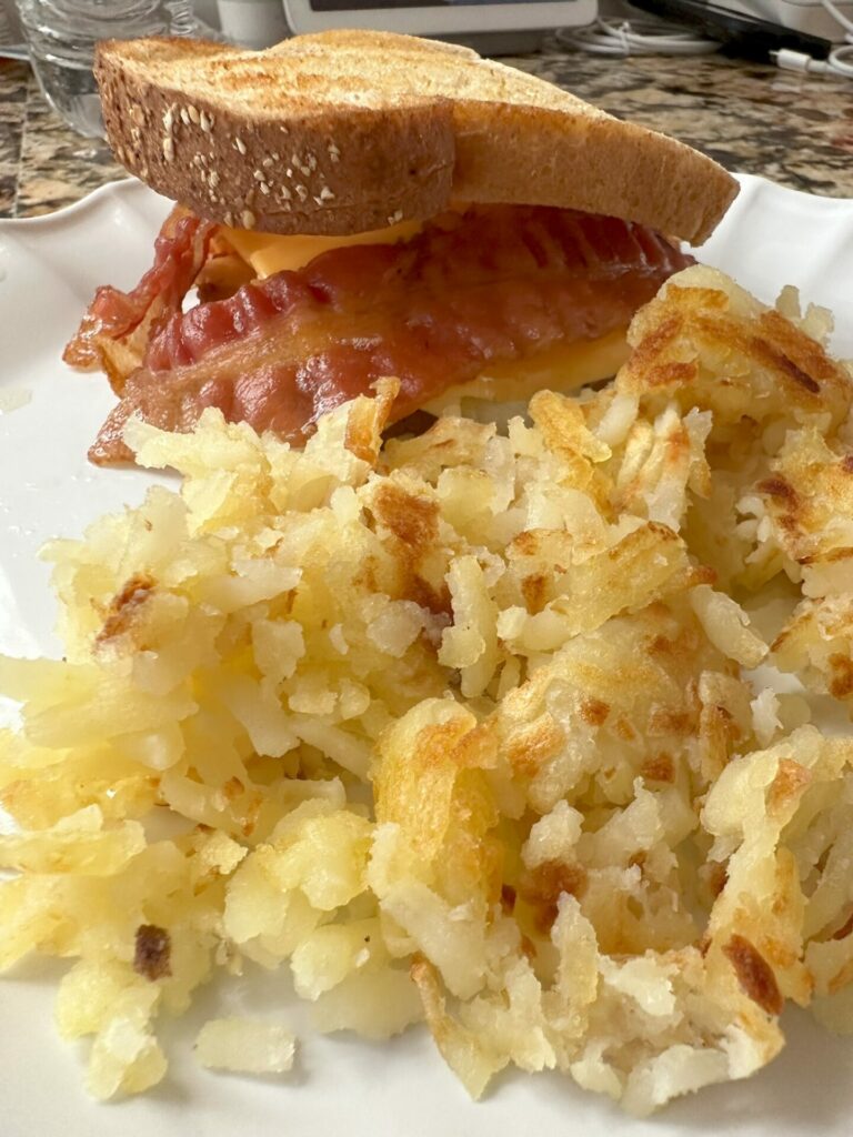 https://www.cookoutnews.com/wp-content/uploads/2023/11/Blackstone-Electric-Griddle-E-Series-Finished-Breakfast-Sandwich-768x1024.jpg